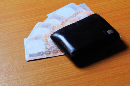Baht out of wallet  の写真素材