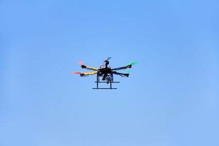 copter with camera. A motion blur on rotor blades