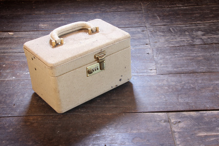 An old vintage cream train case or makeup luggageの写真素材