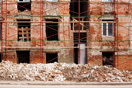 Process of reconstruction of an old building. Ruined walls, bricの写真素材