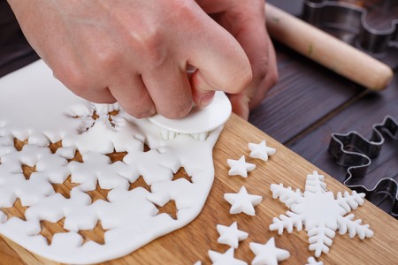 Making of confectionery mastic decorations in form of stars andの写真素材