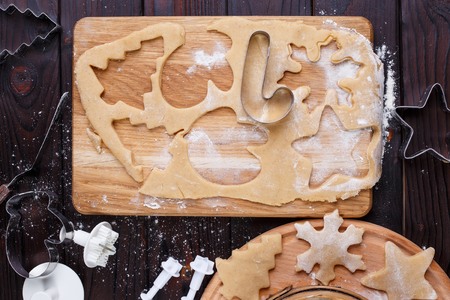 Gingerbread dough with christmas theme shapes and raw cookies, fの写真素材