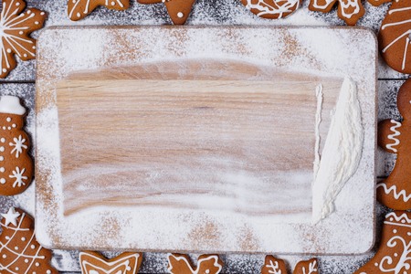 Christmas kitchen background with gingerbread cookies framing anの写真素材