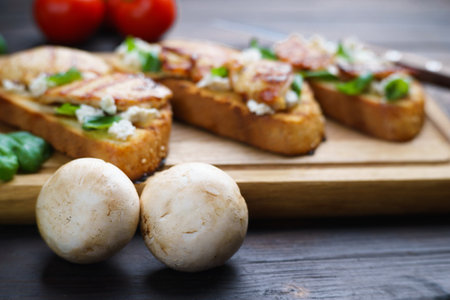 Champignons over food background, delicious mushroom recipeの写真素材