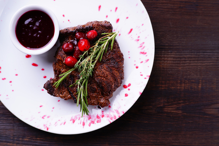 Grilled beef steak with berry sauce flat layの写真素材