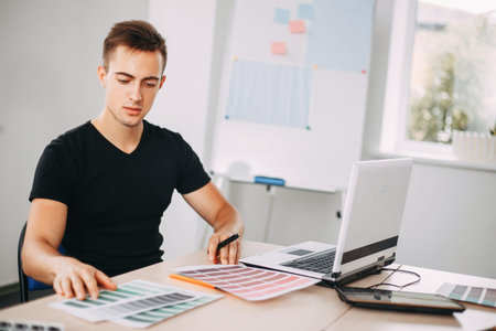 Professional colorist working with color palettes