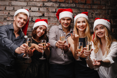 friends invite to join to Christmas celebrationの写真素材