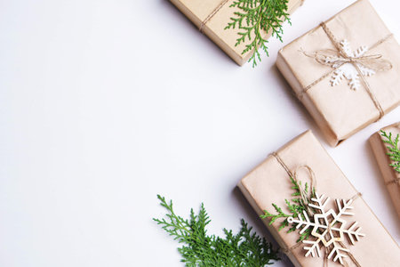 Christmas gift boxes on white table, copy spaceの写真素材