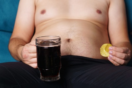 overeating, sedentary lifestyle, hormonal disorderの写真素材