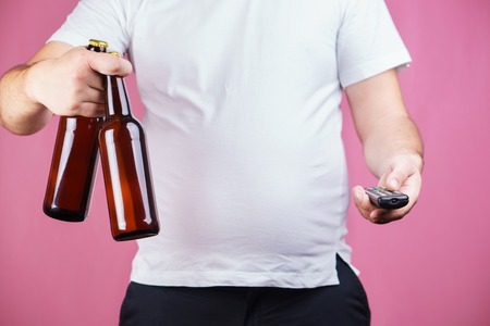 beer belly, alcoholic addiction. fat man with beerの写真素材