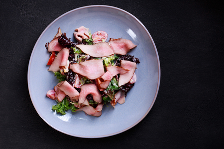 gourmet warm salad of roast beef and vegetablesの写真素材