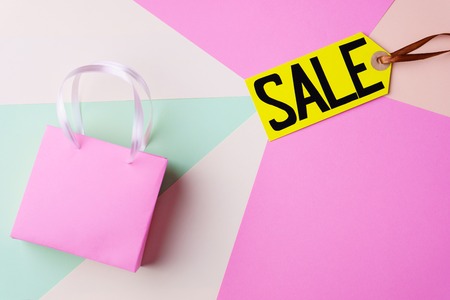 price sticker and shopping bag on light backgroundの写真素材