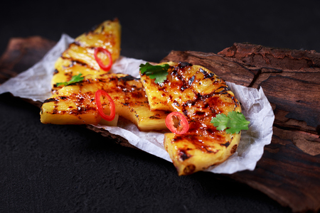 grilled pineapple slices, restaurant menuの写真素材