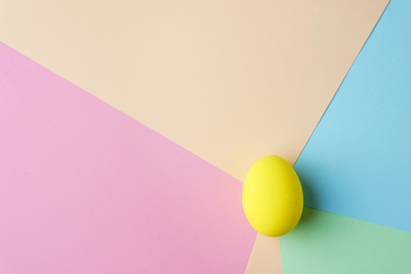Painted colored easter egg on pastelの写真素材