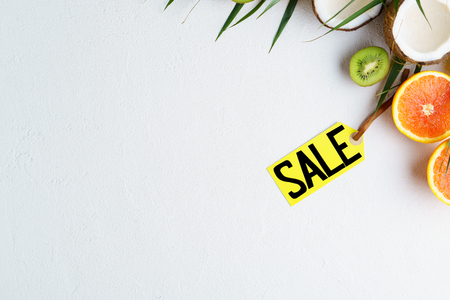 Summer vacation sale, price tag and exotic fruitsの写真素材