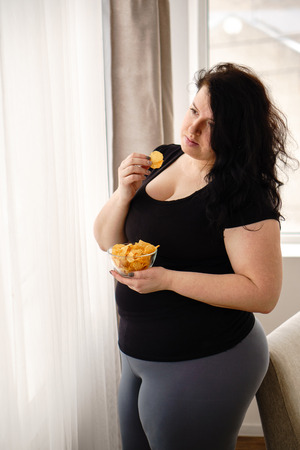 Weight loss, overweight, diet, fast food, overeatの写真素材