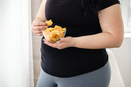 Weight loss, overweight, diet, fast food, overeatの写真素材