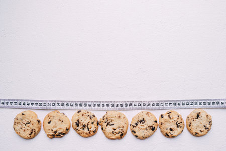 Chocolate cookie  and measure tape