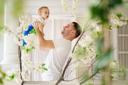 Man playing with his little son. fathers loveの写真素材