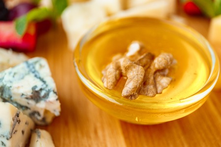 Blue cheese, dorblu slices close up.の写真素材