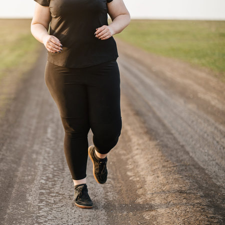 Cropped portrait of overweight runner go jogging