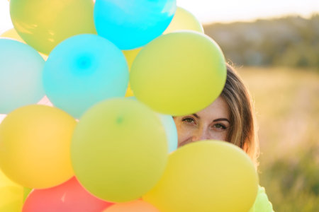 Happiness, enjoy the life, birthday party, bright moment, summertime, creativeness. Young girl with...