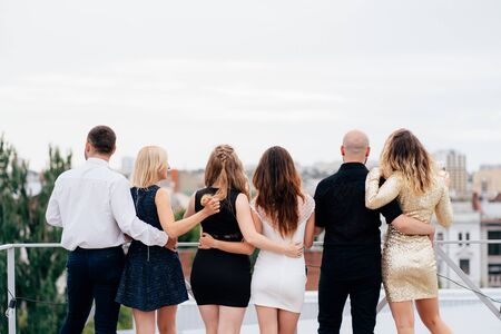 Company of friends celebrating special dayの写真素材