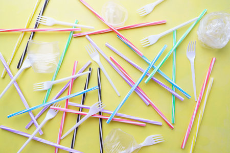 Plastic garbage on yellow