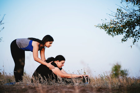 Overweight woman training with trainer supportの写真素材