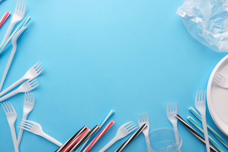 Plastic garbage on blue