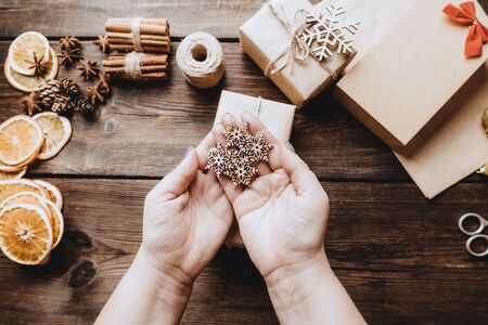 Woman preparing gifts for Christmasの写真素材
