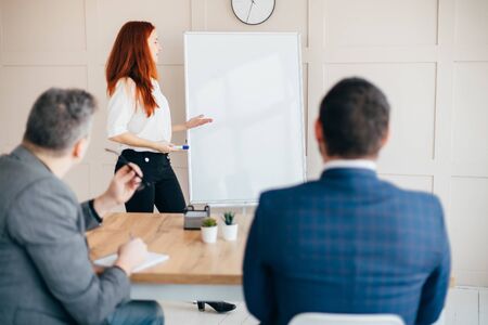 Business people team making presentation at officeの写真素材