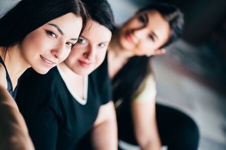 Group of women having fun together in gymの写真素材