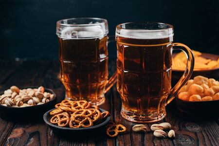 lager beer and salty traditional appetizersの写真素材