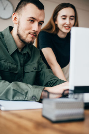 Young creative business people collaborating
