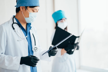Scientists and doctors at work in laboratory.