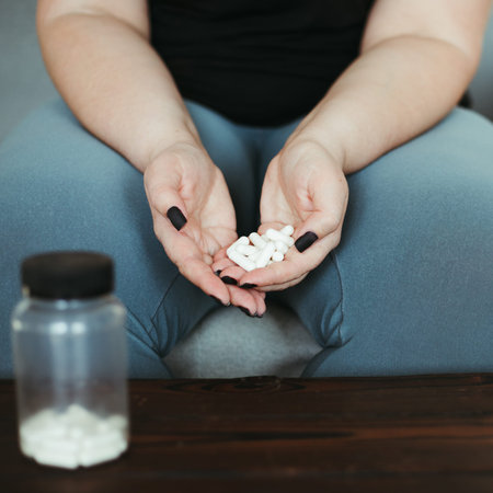 overweight fat woman with pillsの写真素材