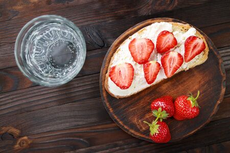 Homemade strawberry bruschetta with cottage cheeseの写真素材