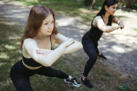 Runners preparing for morning workout in the parkの写真素材