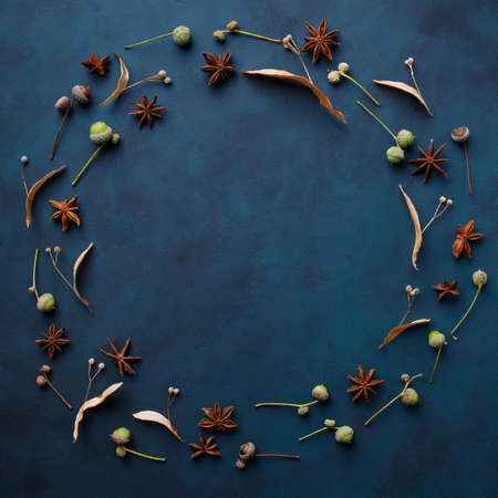 Autumn floral greeting card with dry foliageの写真素材