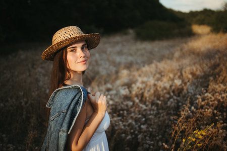 Happy carefree woman enjoy her vacation in natureの写真素材