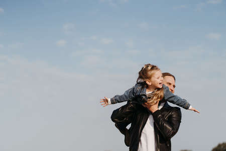 Dad and daughter. Fatherhood, family concept. Loving father having fun spending time with his little daughterの写真素材