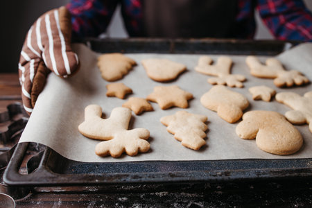 Christmas and New Year holidays, family celebration traditions.Woman with freshly baked christmas...