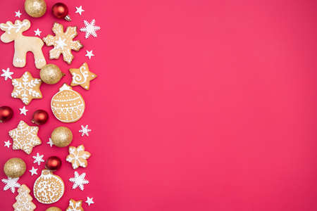 Christmas and New Year composition. Festive decorations and homemade gingerbread with copy space for text design. Holiday and celebration concept, greeting card or invitation mockupの写真素材