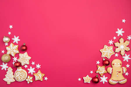 Christmas and New Year composition. Festive decorations and homemade gingerbread with copy space for text design. Holiday and celebration concept, greeting card or invitation mockupの写真素材