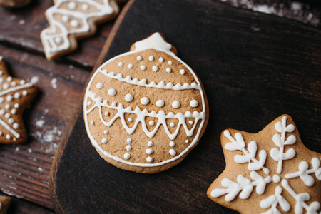 Christmas and New Year celebration traditions. Kitchen background with homemade gingerbread cookies...