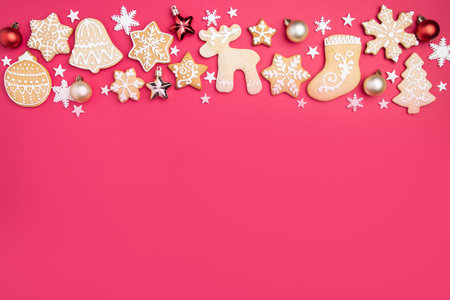 Christmas and New Year composition. Festive decorations and homemade gingerbread with copy space for...