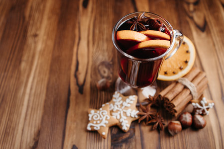 Christmas and New Year cozy holiday composition with hot mulled wine, gingerbread cookies and...