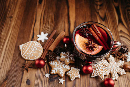 Christmas and New Year holiday vibes. Winter still life. Hot mulled wine, gingerbread cookies and spices. Home weekend conceptの写真素材