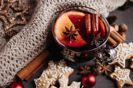 Mulled wine with cinnamon, orange and anise. Christmas or New Year traditional wine, hot drinkの写真素材